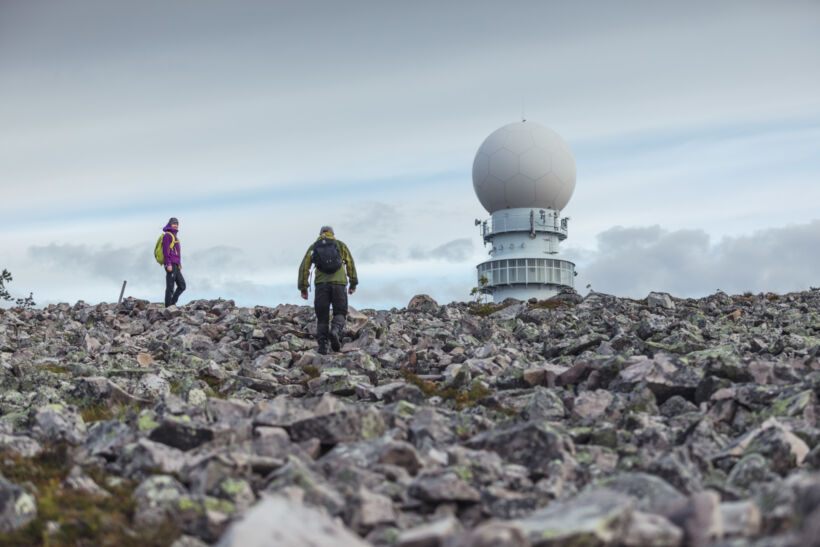 Hiking toward the Doppler radar station on a stone field in Pyhä-Luosto, a Lapland filming location