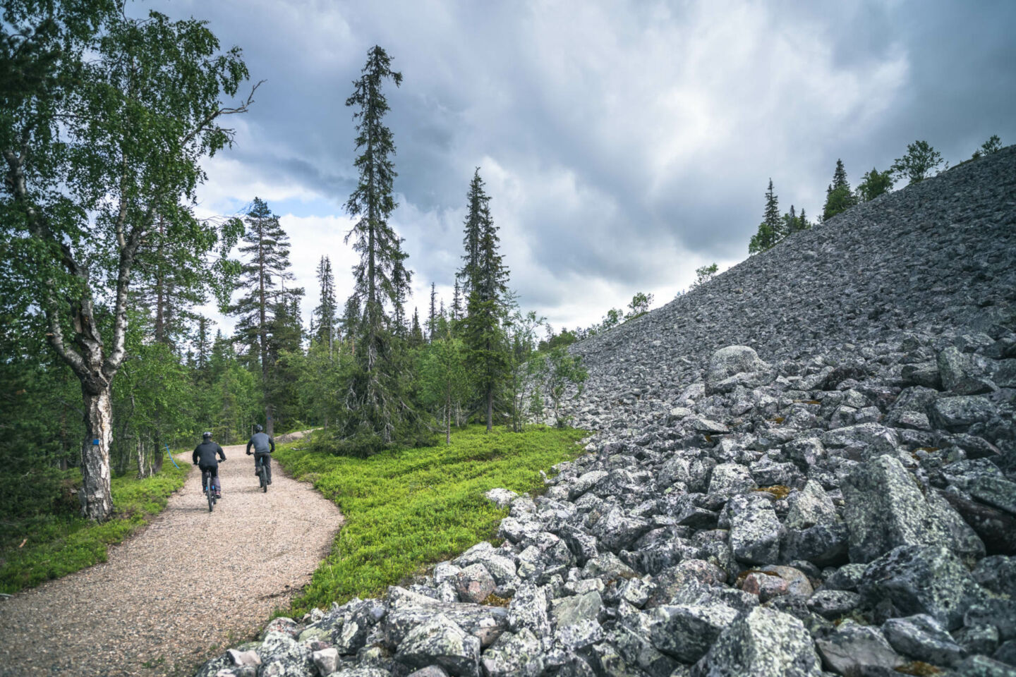 Biking beside stone fields in Pyhä-Luosto, a Lapland filming location