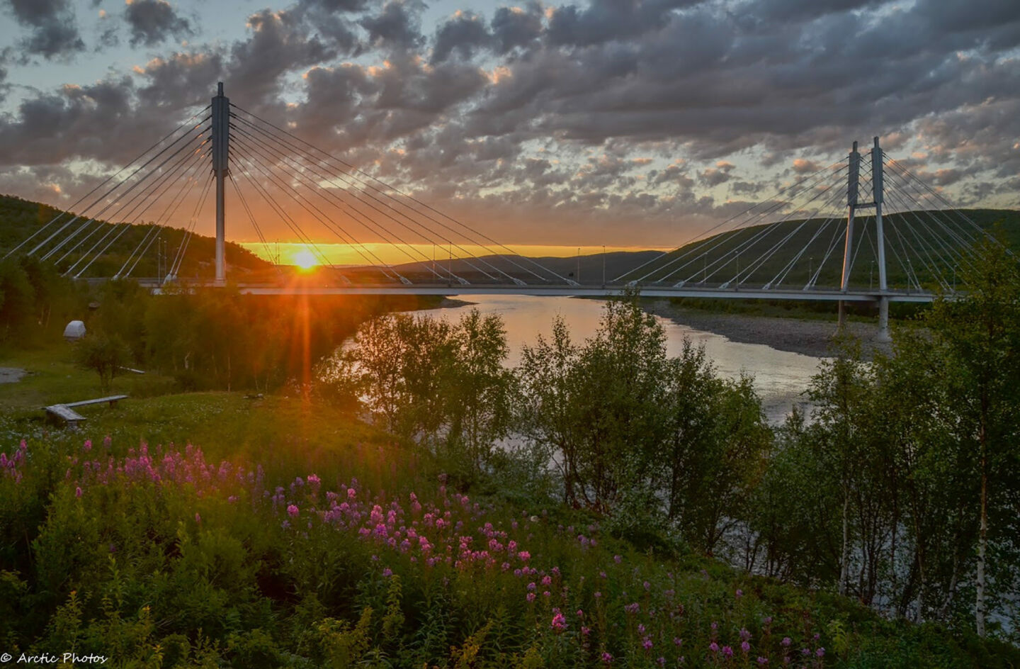 Summer sunrise over the bridge in Utsjoki, a Finnish Lapland filming location