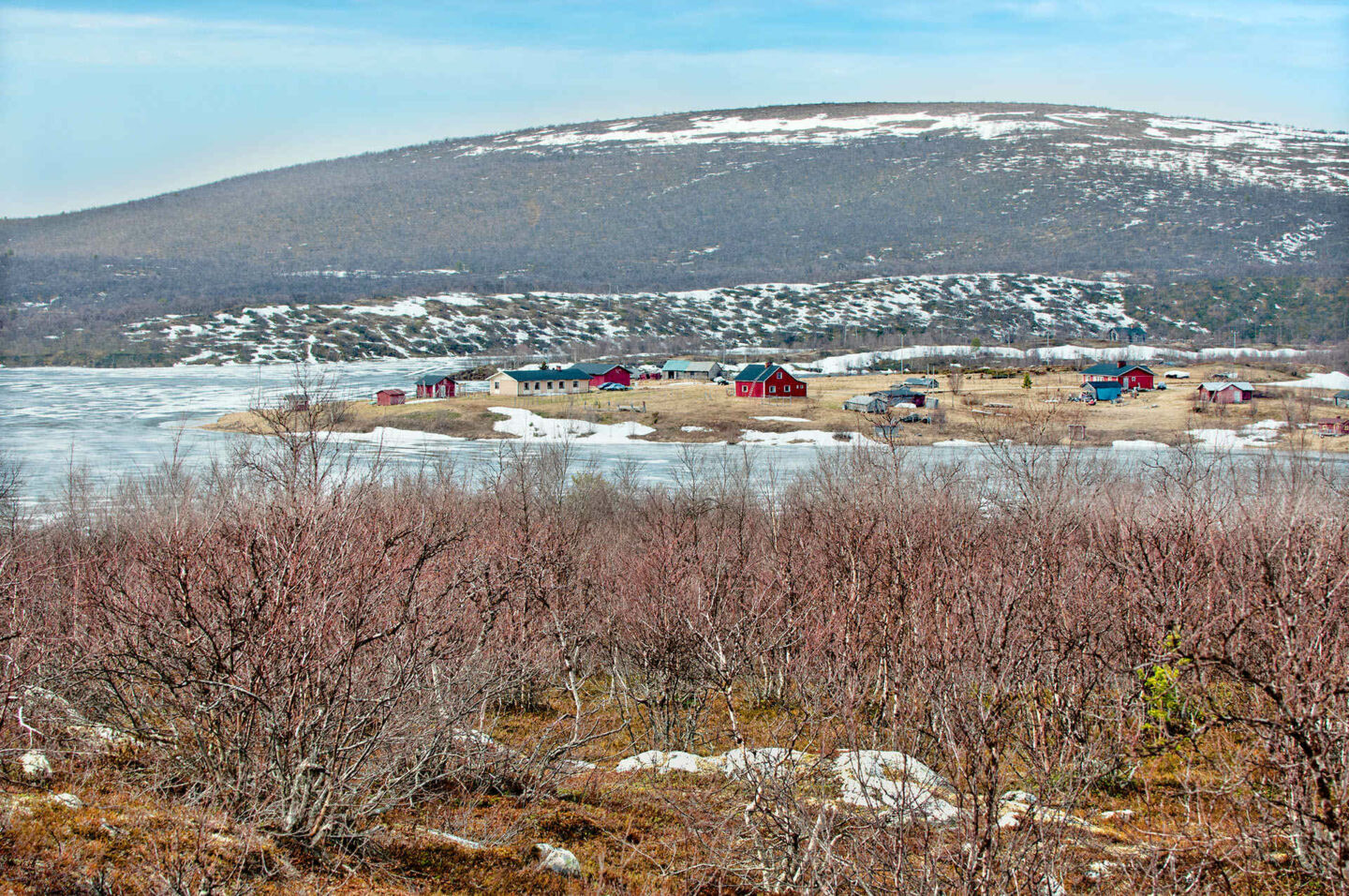 Nordic village in the shadow of the mountains in Enontekiö, a Finnish Lapland filming location