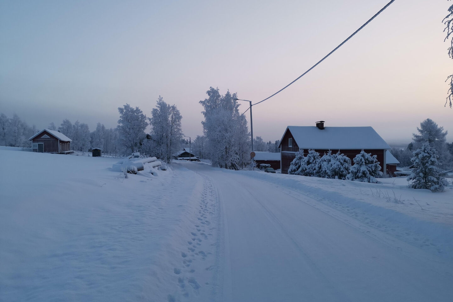 A snowy rural road in Sirnio in Posio, a Finnish Lapland filming location