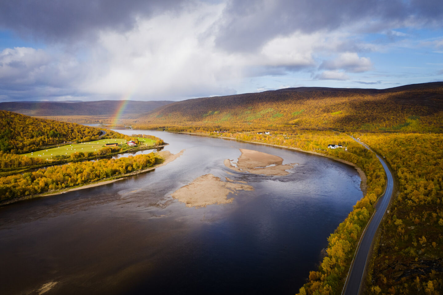 Rainbow over a tundra river valley in Utsjoki, a Finnish Lapland filming location