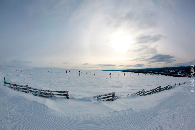 Snow-covered fences in Inari, a Finnish Lapland filming location