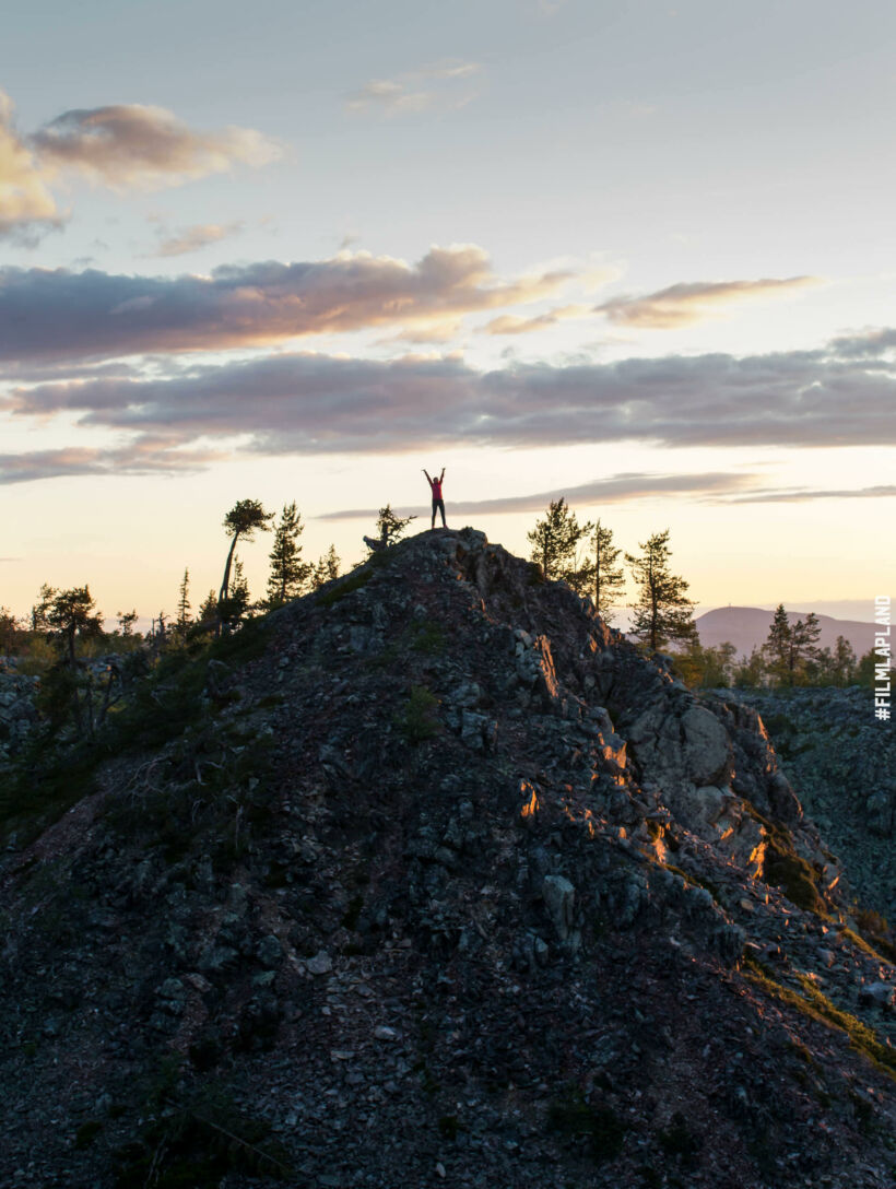 Climbing a hill in Pyhä-Luosto in summer, a Finnish Lapland filming location