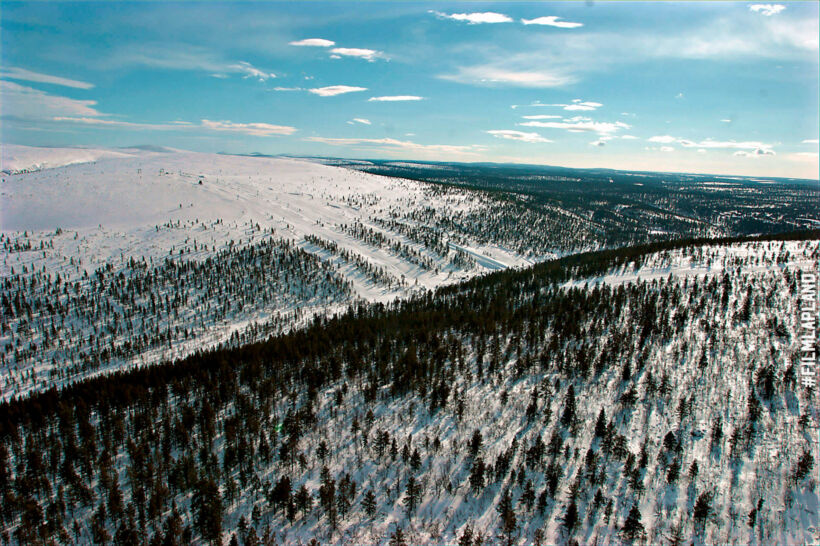 A snowy forest canyon in Inari, a Finnish Lapland filming location