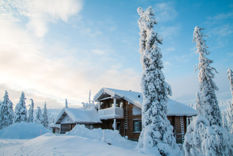 A snow-covered cabin in Levi, a Finnish Lapland filming location