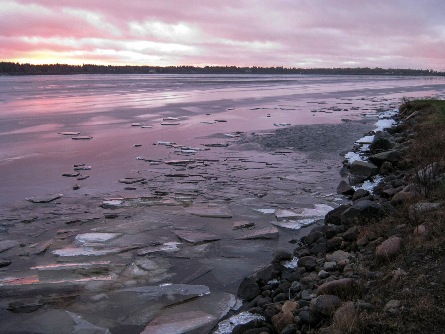 Ice breaking up in the river in Keminmaa, Finland, in retro and rural Sea Lapland